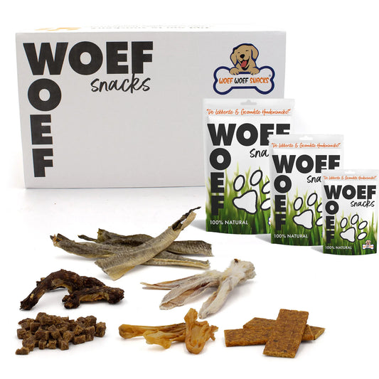 Middelgrote Woef Woef snackbox (10–25 kg) met gevarieerde, 100% natuurlijke hondensnacks: o.a. gedroogde kippenpoten, buffeloren, ossenstaart, strips en trainers; graan- en suikervrij.